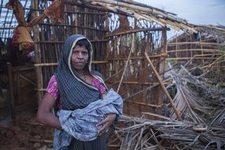 SavetheChildren_Cyclone_Phailin_house_mother_baby_2013 SavetheChildren_Cyclone_Phailin_house_mother_baby_2013