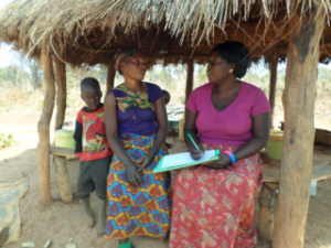 Evelyn conducting child enrollments into Sponsorship