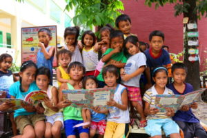 Children in a reading camp in the Philippines. Photo Credit: Save the Children: Philippines