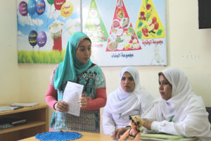 Samar conducting a training with local nurses.