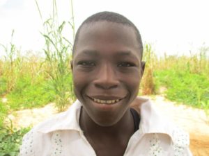 12-year-old Adam has grown a lot since joining reading camps.