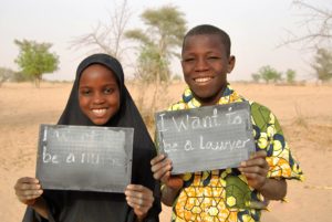 Adam and his classmate Raouda show their dreams for the future.
